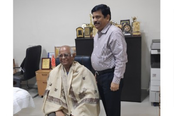 Principal Dr. Srinivas Rao honouring Secretary NSF Sri Ch. Hanumantha Rao and member of AU65EAA dated 28-03-2019